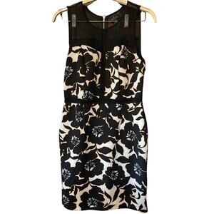 Worthington sleeveless dress with detailed trim and mesh neckline. Size 12.